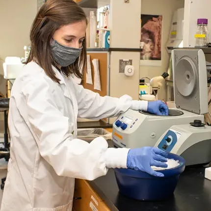 A student using lab equipment